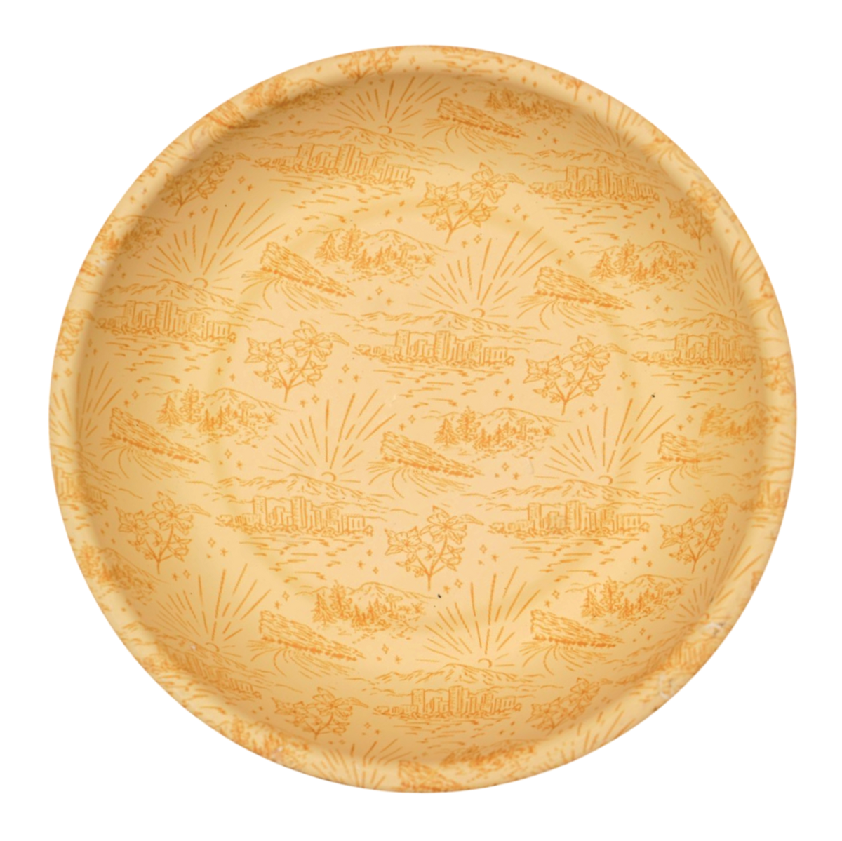 A round magnetic bowl with a light beige background and an orange printed toile-style pattern of trees, stars.