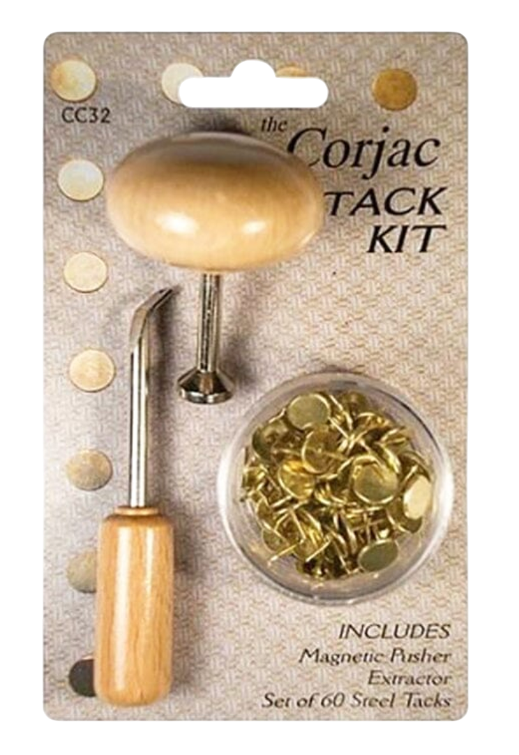The Corjac Tack Kit in retail blister packaging, featuring a wooden-handled magnetic tack picker, a metal tack driver, and a clear container of brass-colored steel tacks.