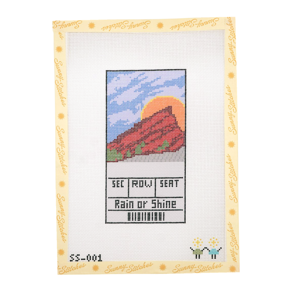 A counted cross-stitch Red Rock Ticket canvas from Sunny Stitches, featuring a mountain landscape under a blue sky with a yellow sun and the text 'SEC | ROW | SEAT Rain or Shine'. The canvas has a white stitched background with a beige border printed with the brand name.